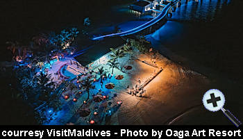 courtesy VisitMaldives - Oaga Art Resort by Night aerial-view